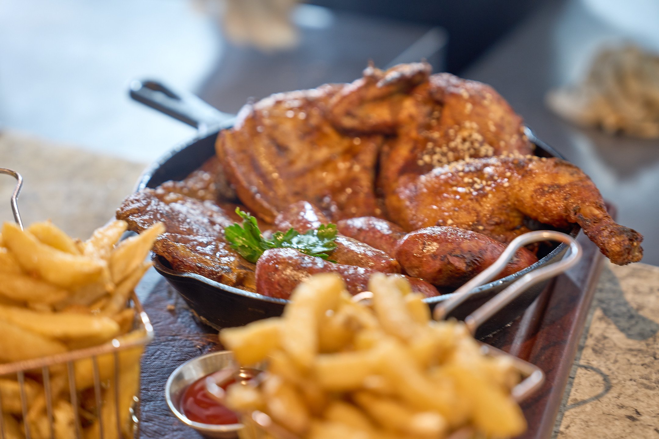 The Bradley platter: flame-grilled chicken, sausage and fries